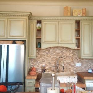 Eggshell painted and aged Bordeaux kitchen